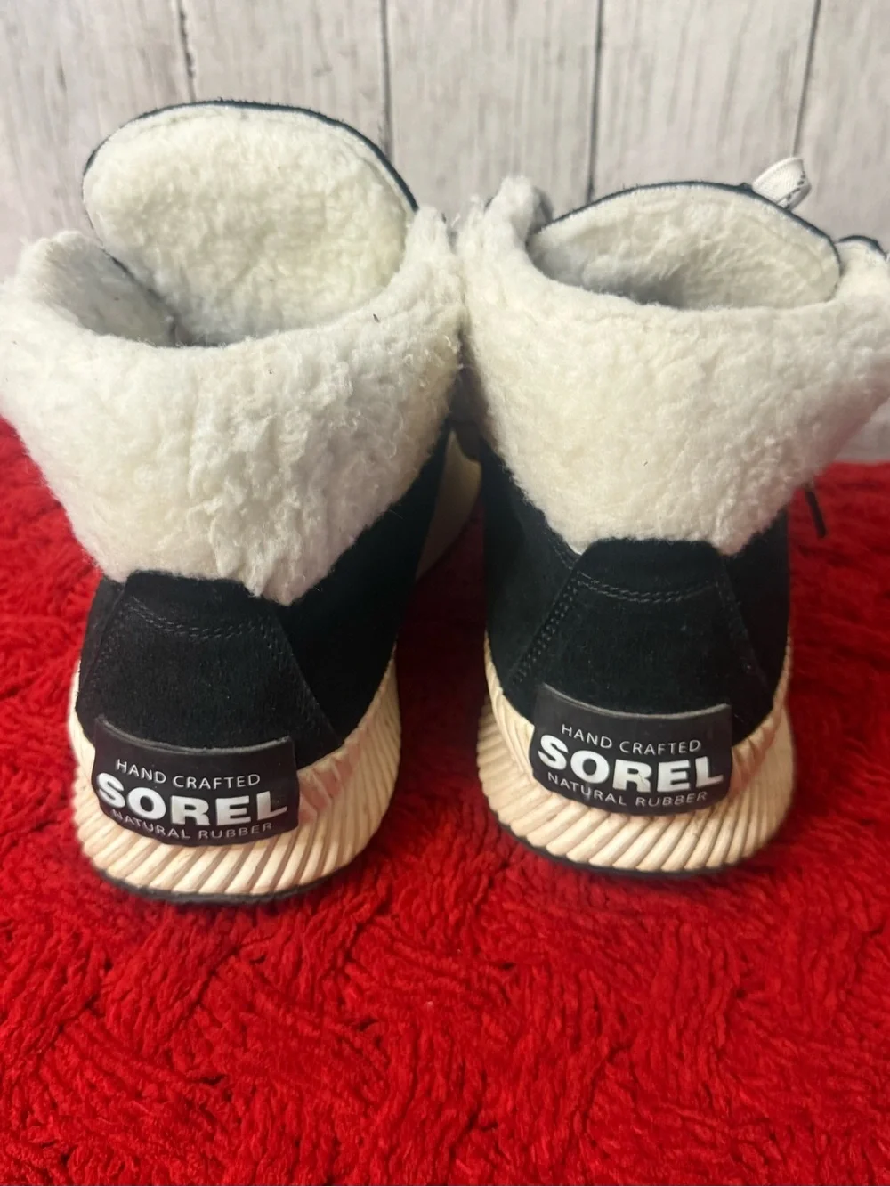 Sorel black suede lace up hiking boots with fur lining. Size US 12
